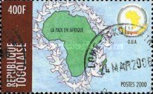 Map surrounded by doves and the logo of the O.U.A.