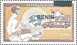 African drummer and Renault mail truck