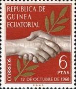 Clasped hands and laurel