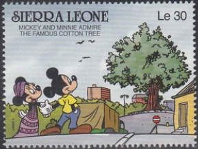 Mickey and Minnie admire the famous cotton tree