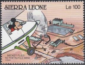 Mickey flies in a plane to the Rutile Mine