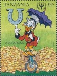 The letter "U" - Uncle Scrooge on his unicycle