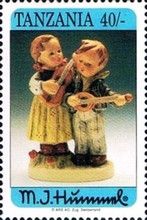 Girl with guitar, boy with banjo