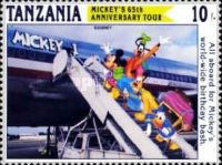 Mickey Mouse, Goofy, Pluto and Donald Duck boarding airliner
