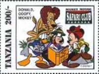 Donald Duck, Goofy, Mickey Mouse and a lion
