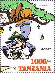 Goofy hanging from a tree photographing a rhinoceros