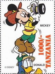 Mickey Mouse on Donald Duck's shoulders photograping giraff