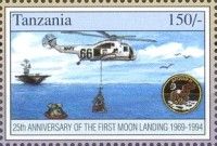 Helicopter lifting men on board