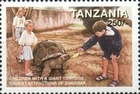 Children with giant tortoise