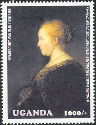 A young Woman in profile with fan