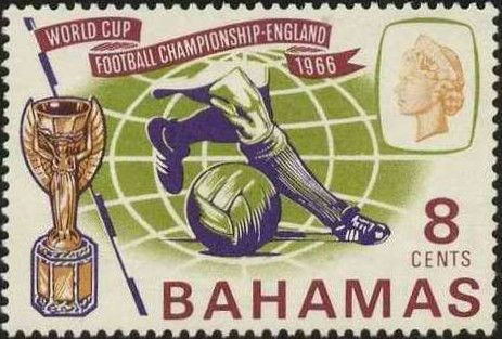 Footballer's legs, ball and Jules Rimet Cup