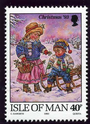 Children with toboggan in the snow