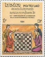 Four men at chessboard