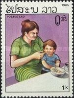 Mother feeding child