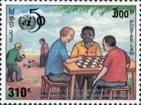 Men Seated at Table Playing Checkers