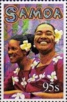 Two women with flowers in hair