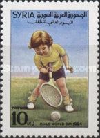 Child holding a tennis racket