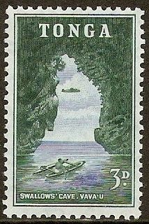 Aircraft flying above canoeist at Swallows' Cave, Vava'u