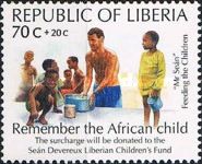 Mr Sean feeding children