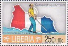 Nation map in flag color, blind man with cane