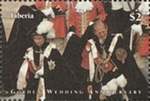 Queen and Prince Philip Wearing Uniform