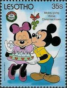 Mickey giving Minnie Christmas Kisses