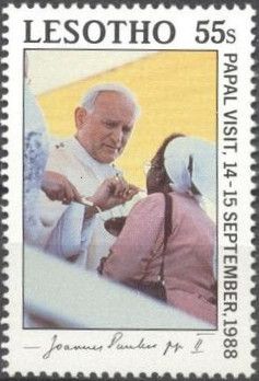 Pope giving communion