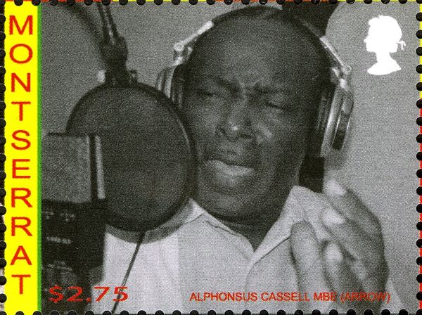 Alphonsus Cassell MBE wearing Headphones