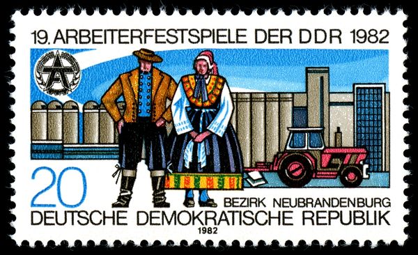 Couple in Costumes, Agricultural Equipment