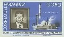 JFK with a rocket launch from Cape Kennedy