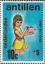 Girl Holding a Piggy Bank