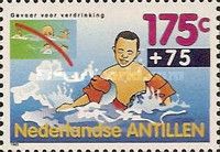 Child Wearing Flotation Equipment While Swimming