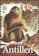 Monkey holding peach, on fan
