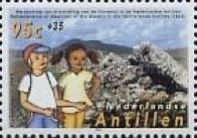 Boy, girl, broken stone walls built by slaves