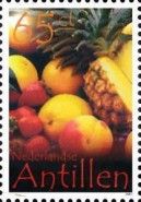 Strawberries, orange, peaches, pineapple