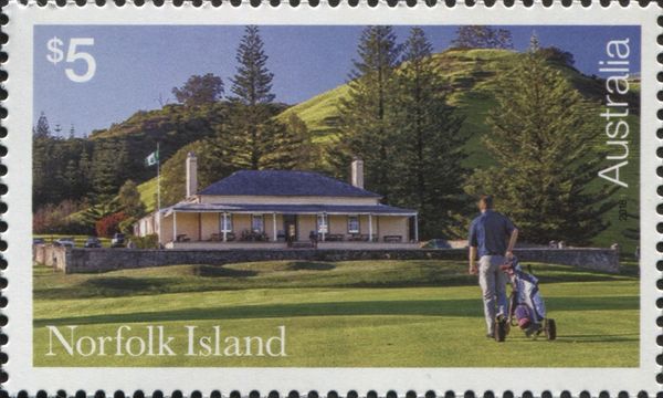 Golfer Walking Towards Clubhouse