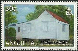 White-painted House with Gabled Roof and Lean-to