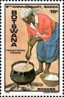 Woman Preparing Bogobe (Cereal Porridge)