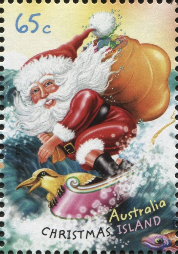 Santa Surfing to Shore with Sack of Presents