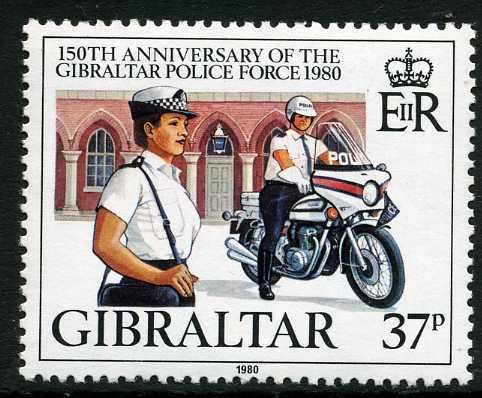 Policewoman, Police Motor-Cyclist and Police Station