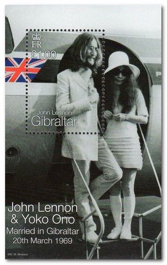 John Lennon Standing on Aircraft Steps