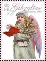 Angel wit Hymn Book and Top of the Christmas Tree