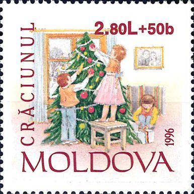 Children Decorating Christmas Tree