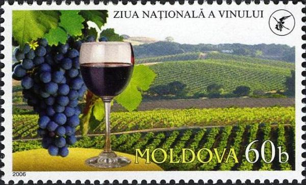 Grapes, Glass of Wine and Vineyard