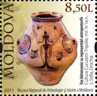 Biconical Vessel with Anthropomorphic Designs and Handles