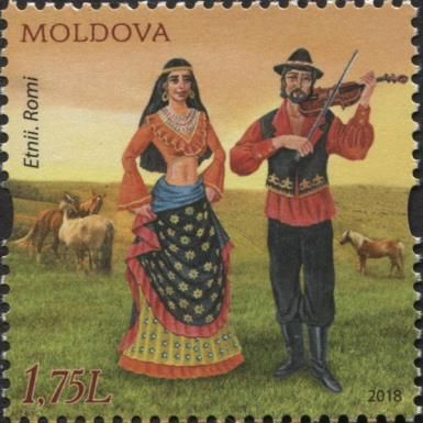 Man and Woman Wearing Traditional Romani Costumes