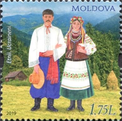 Man and Woman Wearing Traditional Ukrainian Costumes
