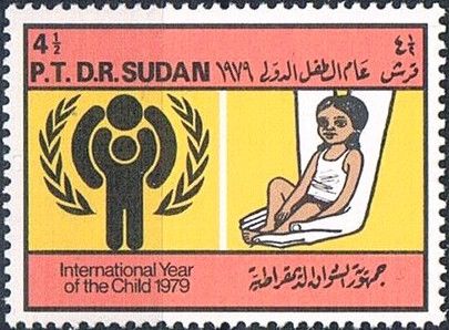 UNESCO emblem and children holding globe
