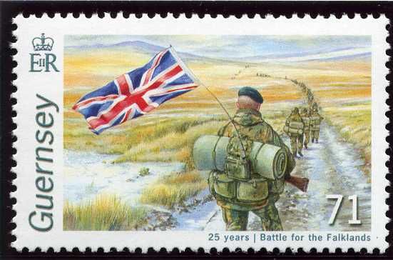 Troops marching with Union Jack towards Port Stanley