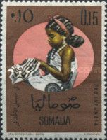 Girl Embroidering Fish on Cloth.